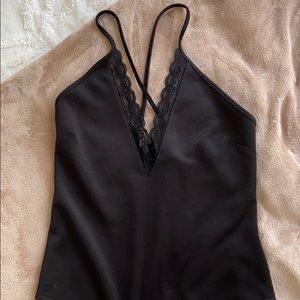 Beautiful lace v neck body suit. Never worn!